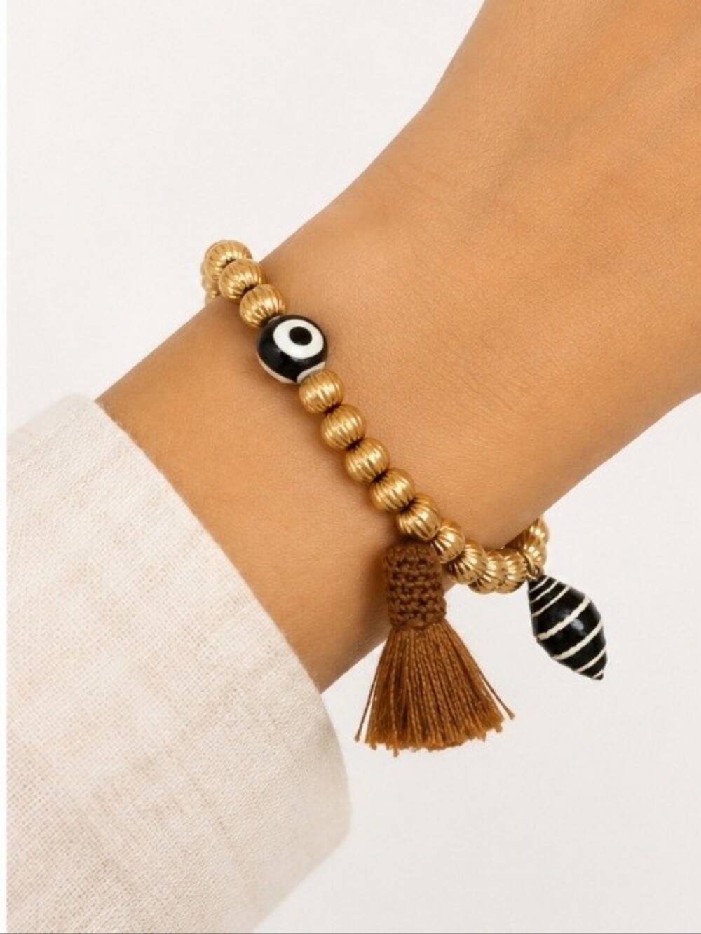 Tory Burch Roxanne Gold Beaded Stretch Bracelet w Evil Eye & Tassel Charm